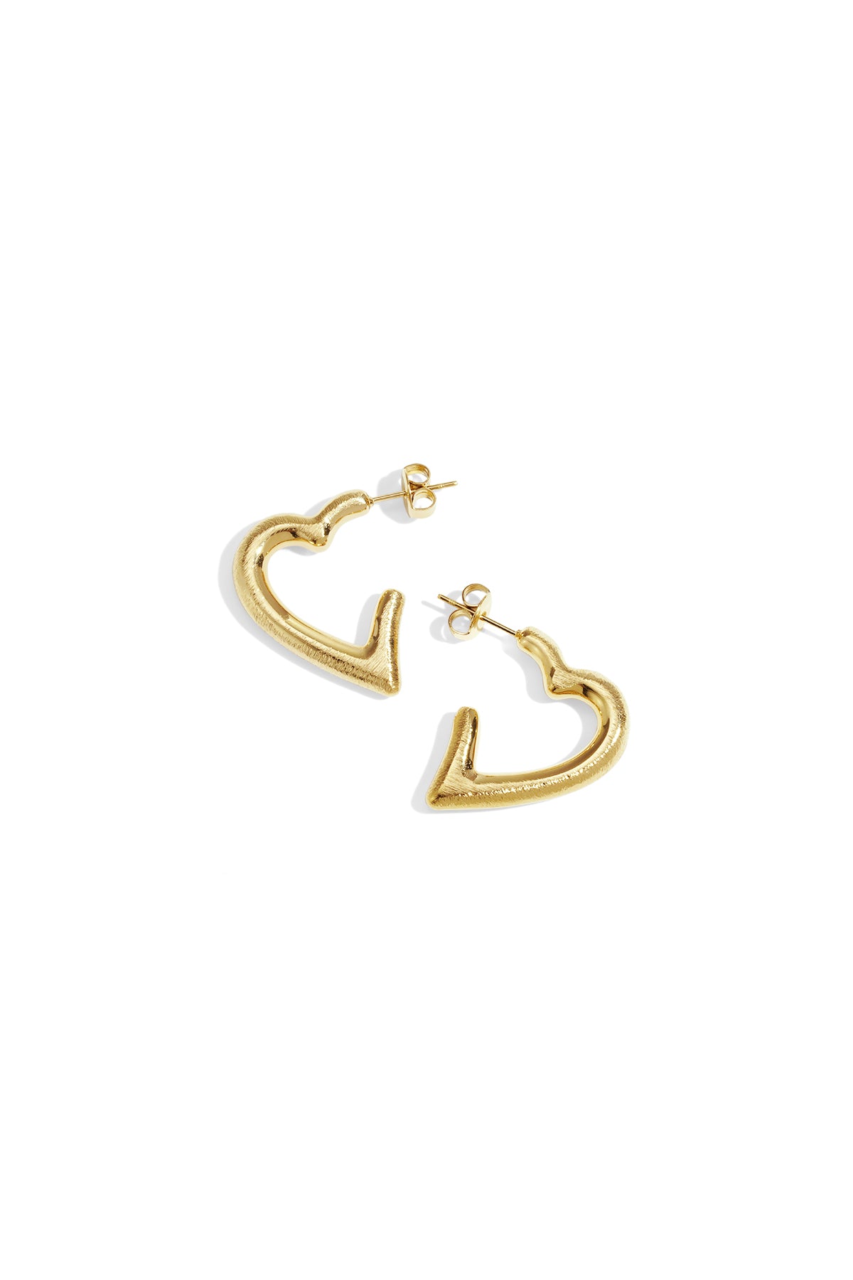 Gold heart hoop earrings with post backings on a white background.