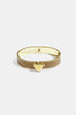 Khaki bangle bracelet with a gold heart charm and gold clasp.