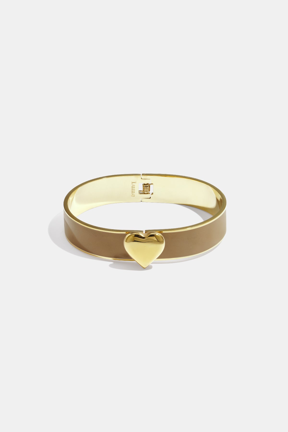 Khaki bangle bracelet with a gold heart charm and gold clasp.