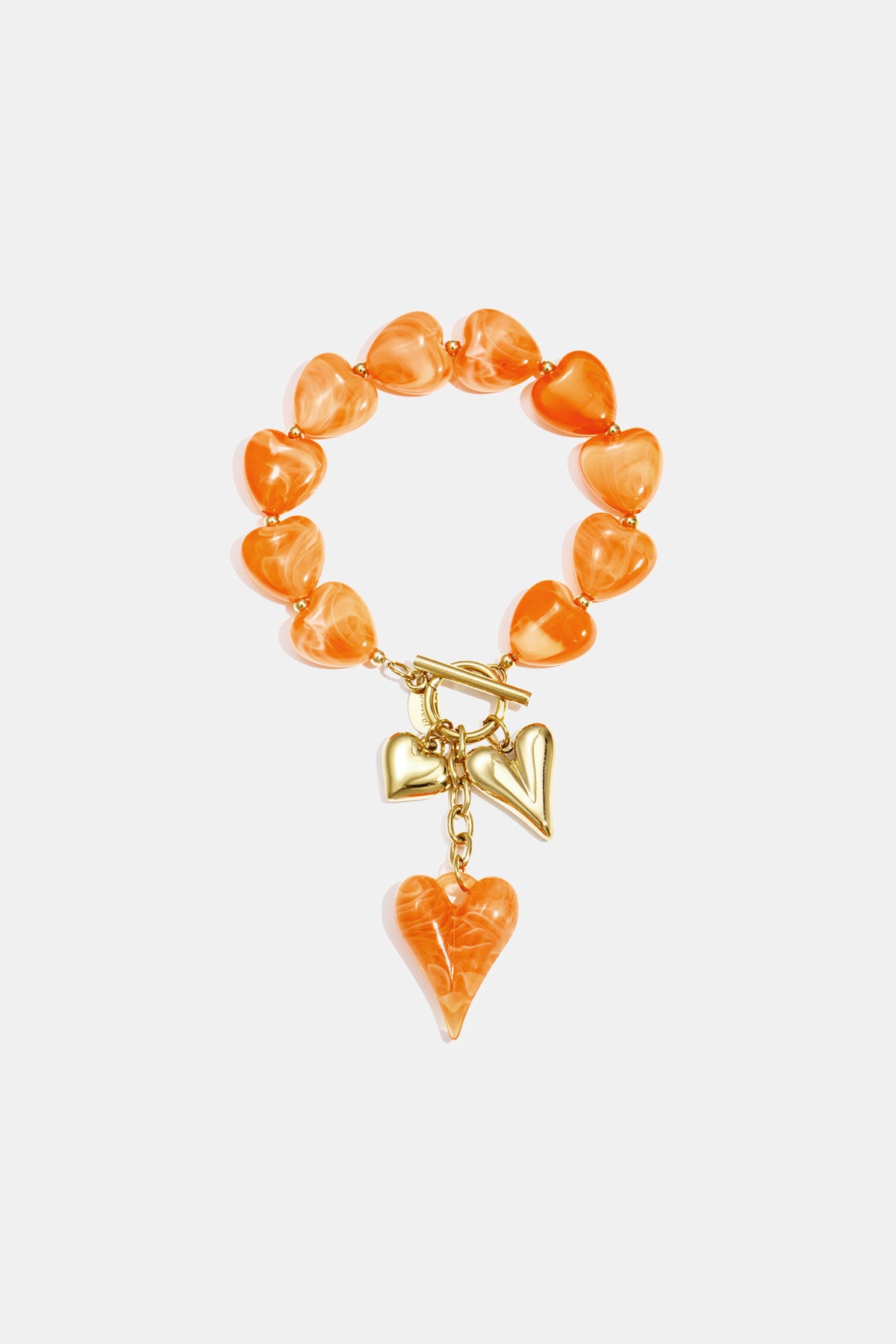 Orange heart-shaped beaded bracelet with gold heart charms and toggle clasp.