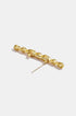 Gold-colored brooch with a linked droplet circle design and a pin closure.