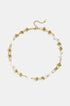 Gold chain necklace with knotted links and baroque pearls, adjustable clasp.