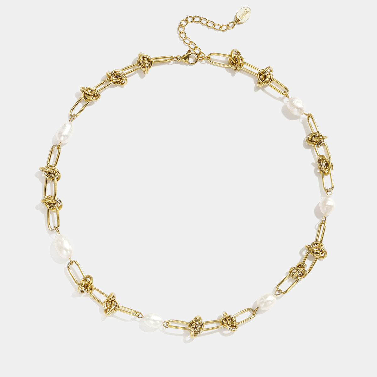 Gold chain necklace with knotted links and baroque pearls, adjustable clasp.