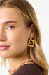 Gold heart drop earrings with a textured finish, worn by a model.