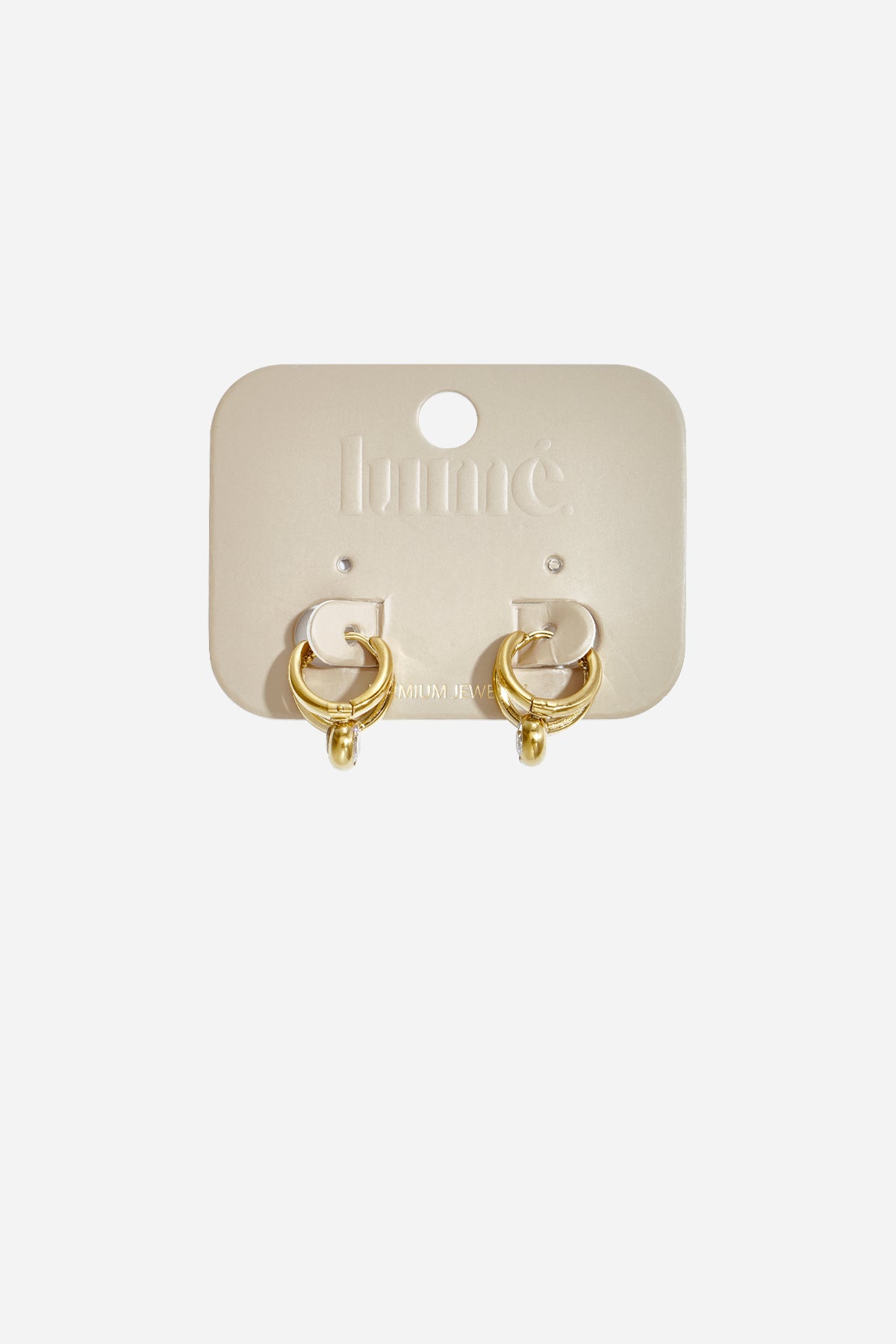 Ondine Irregular Hoop Earrings with gold PVD coating on a light beige card.