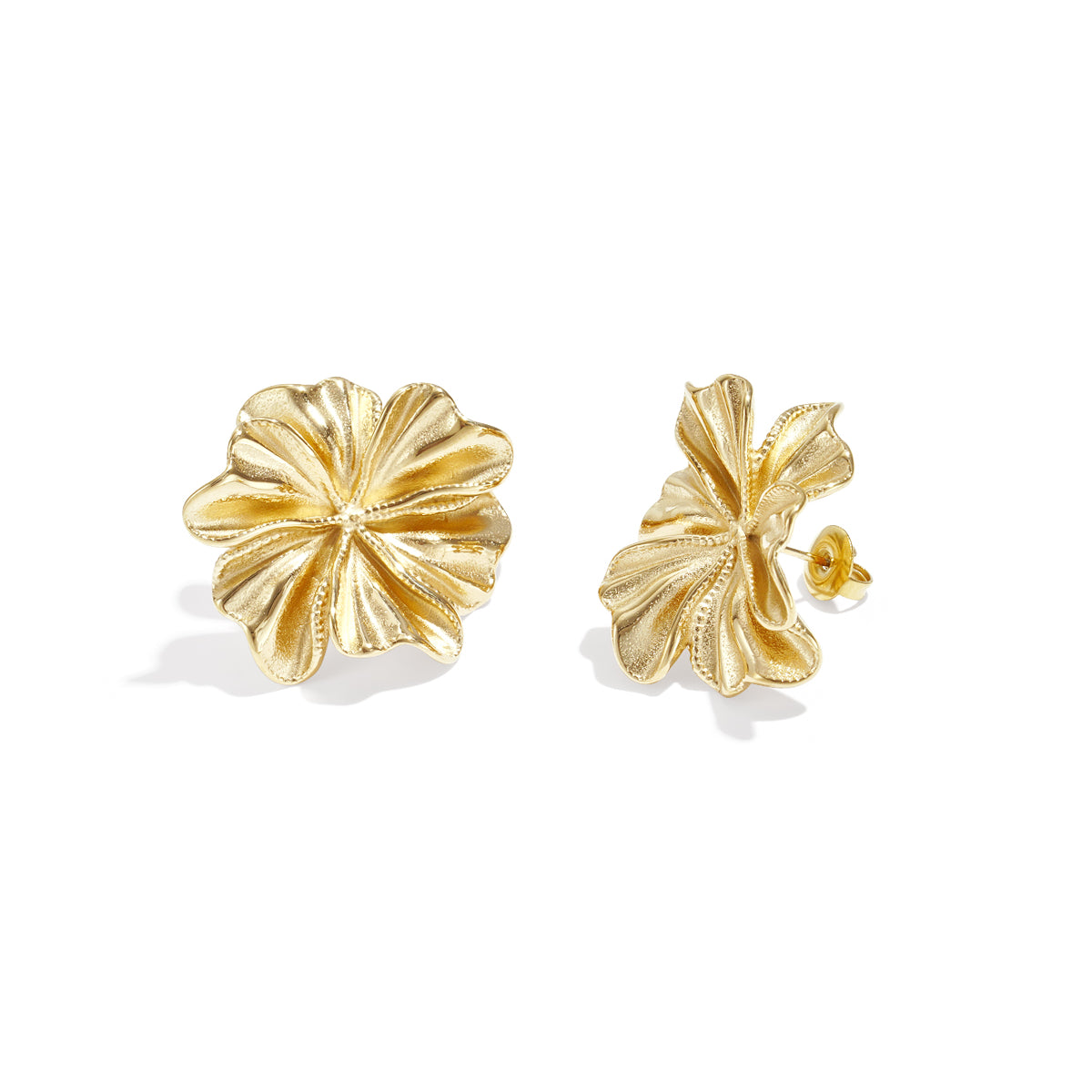 Gold-tone stud earrings shaped like textured flower petals.