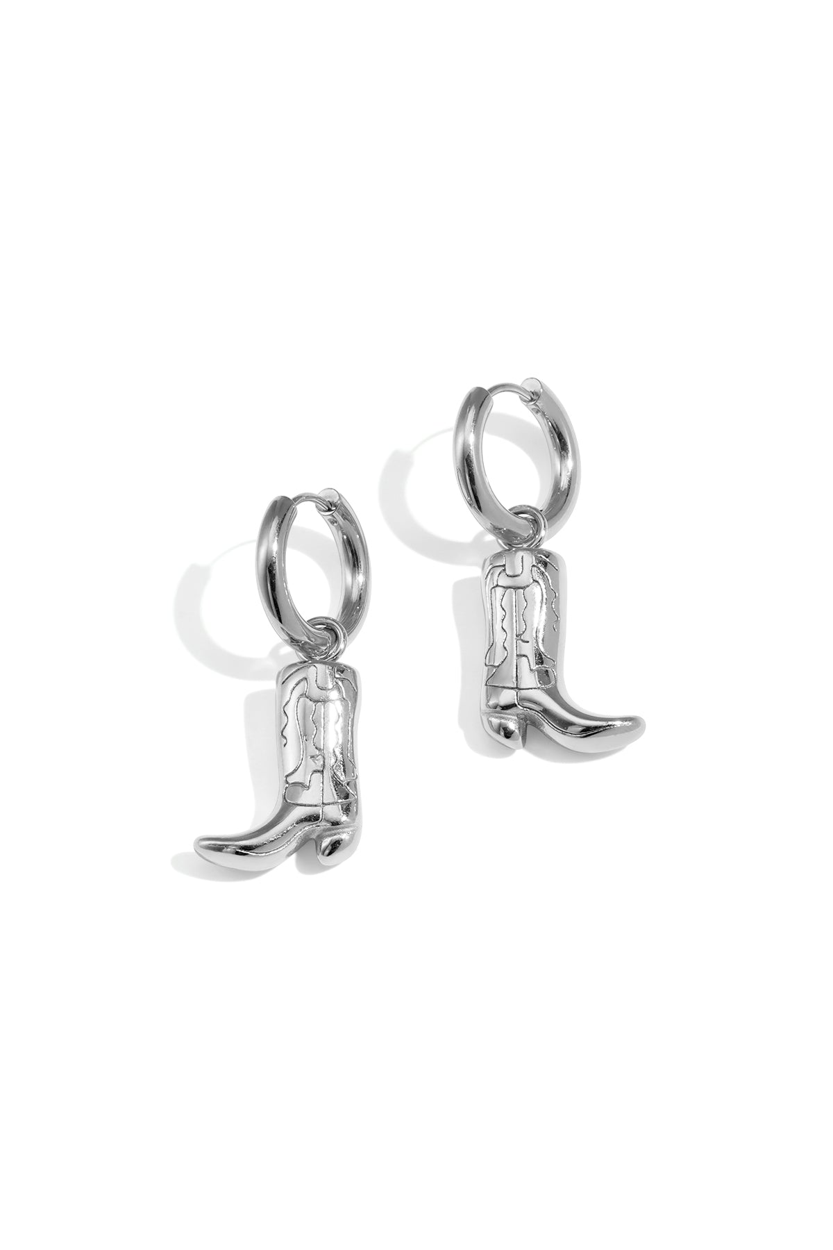 Silver cowboy boot drop earrings with hoop connectors.