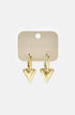 Gold heart drop earrings on a beige card with 'lume' and 'PREMIUM JEWELRY' printed on it.