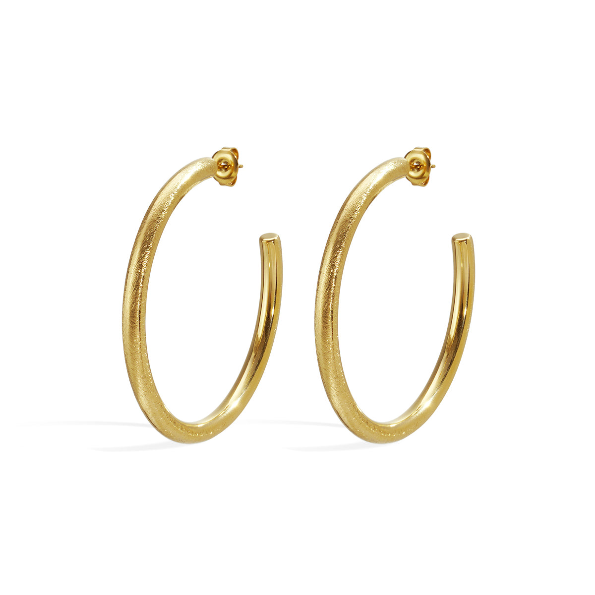 A pair of gold-plated hoop earrings with a brushed finish, presented on a white background.