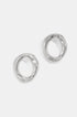 Two silver stud earrings with an irregular, organic shape and a brushed finish.