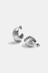 Two silver Aurelia hoop earrings with a textured finish on a white background.