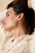 Gold tassel dangle earrings with multiple layers of delicate tassels.
