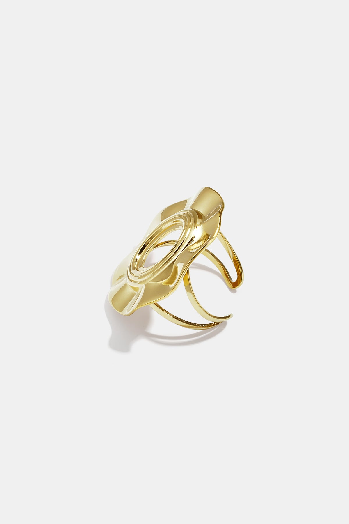 Gold irregular minimalist ring with an oval cutout and textured surface.