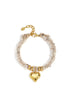 Charming Heart Bracelet with gold heart charm and gold beads on a textured rope band.
