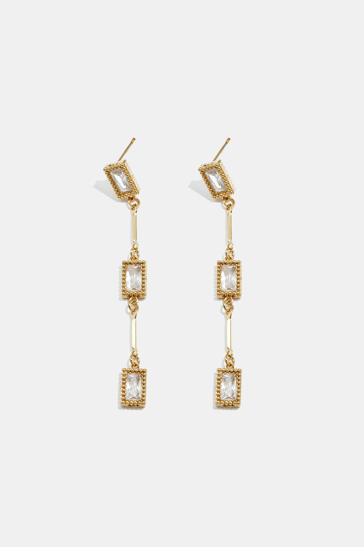 Gold Elara geometric earrings with three rectangular zircon drops.