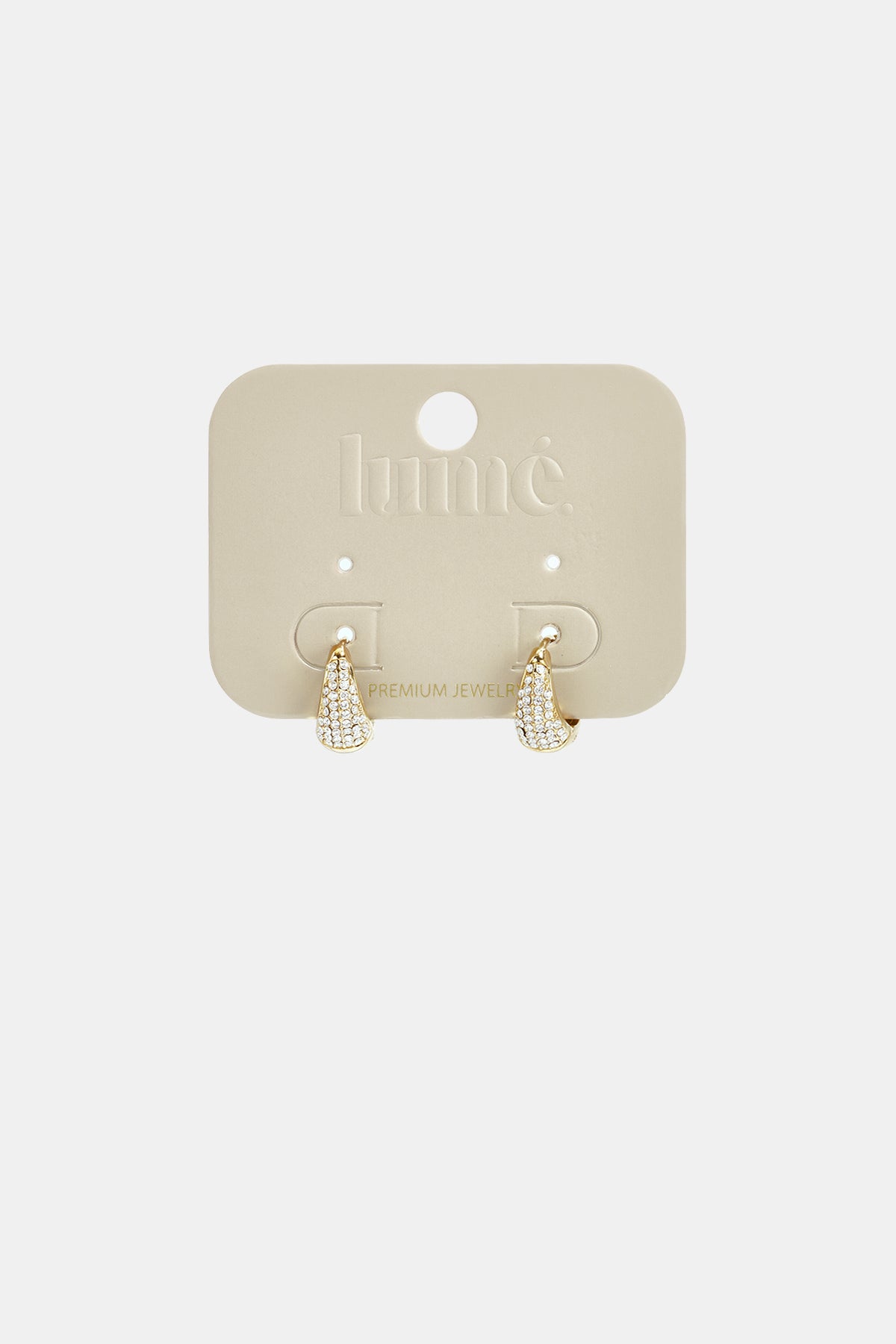 Gold hoop earrings with rhinestones on a beige card.