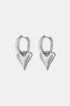 Silver heart drop earrings with oval hoops, against a white background.