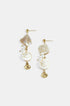 Gold dangle earrings with shells, pearls, and spiral shell charms.
