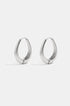 A pair of silver irregular oval hoop earrings with a brushed finish.