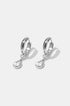 Silver hoop earrings with a dangling pear-shaped zircon and two small round zircons.