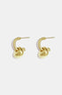 Gold-colored, matte finish drop earrings with irregular sculptural shapes.