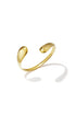 Gold irregular cuff bracelet with a polished finish, casting a shadow on a white background.