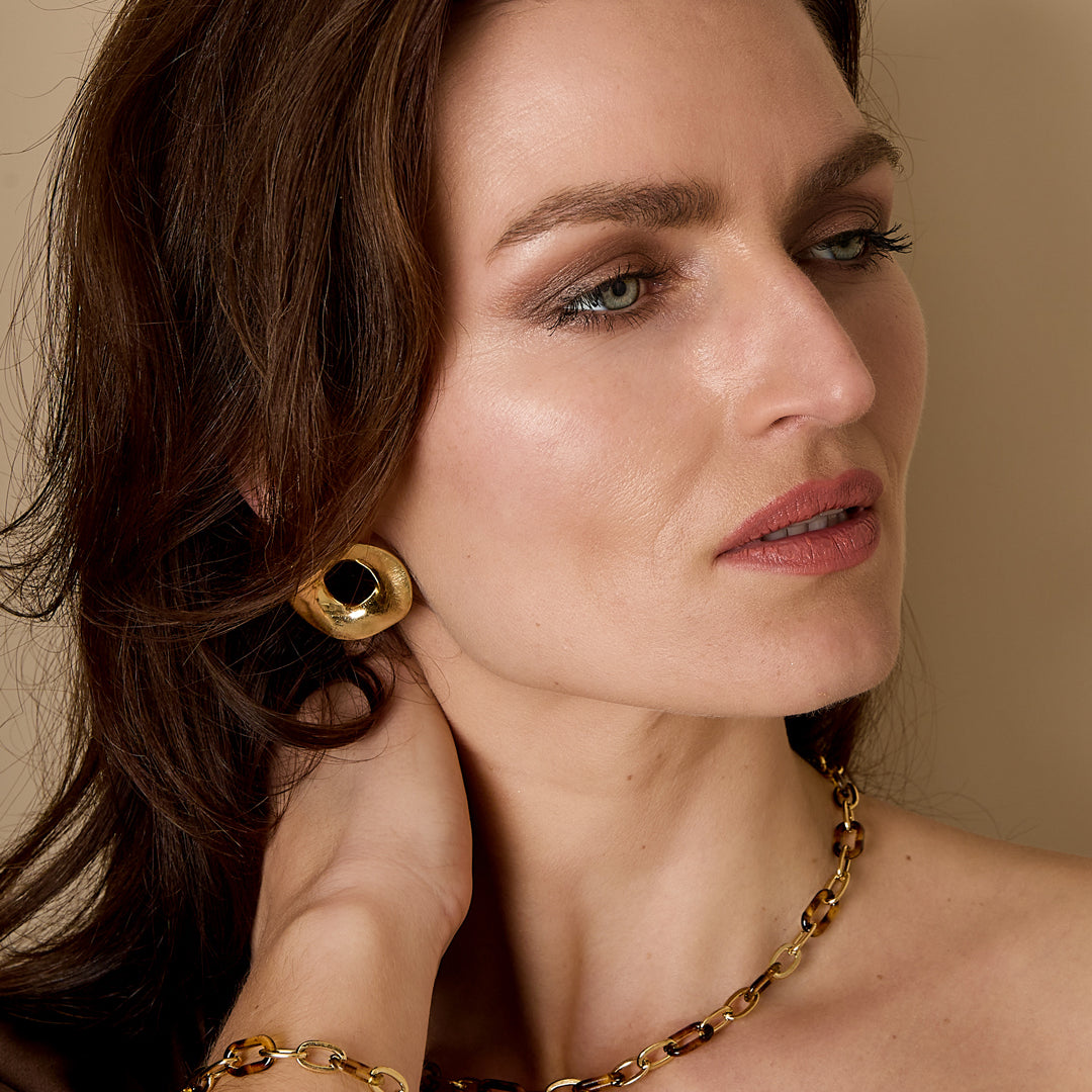 Savannah Chain Bracelet with gold and leopard print links.
