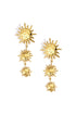 Gold dangle earrings with three sun motifs of decreasing size.