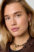 Aurelia Hoop Earrings in gold, worn by a model.