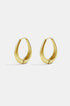 Gold irregular oval hoop earrings with a brushed finish.